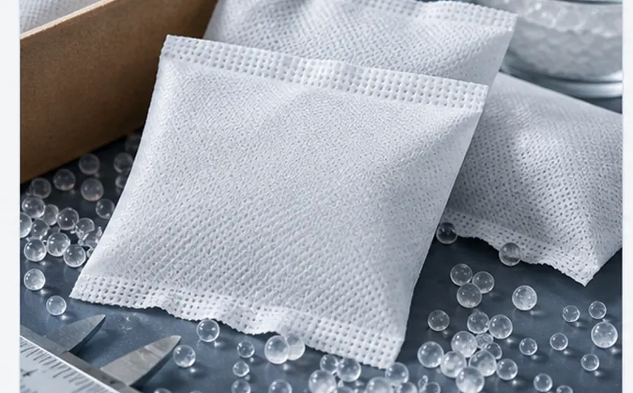 Silica gel sachets and loose beads prepared for pack selection